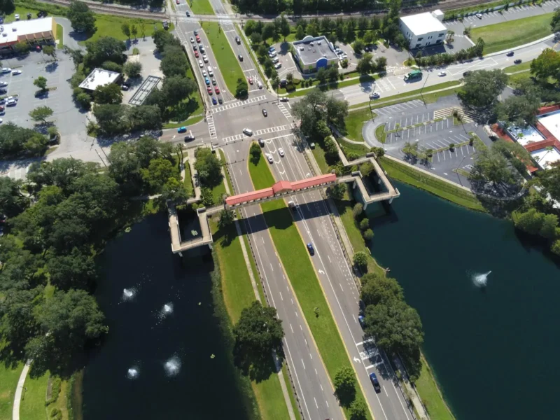 Overhead view of a Lutz, FL road and ponds lined with live oaks