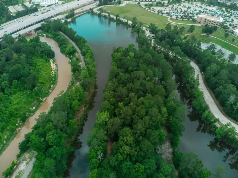 Aerial view of wooded riverfront land in Riverview, FL
