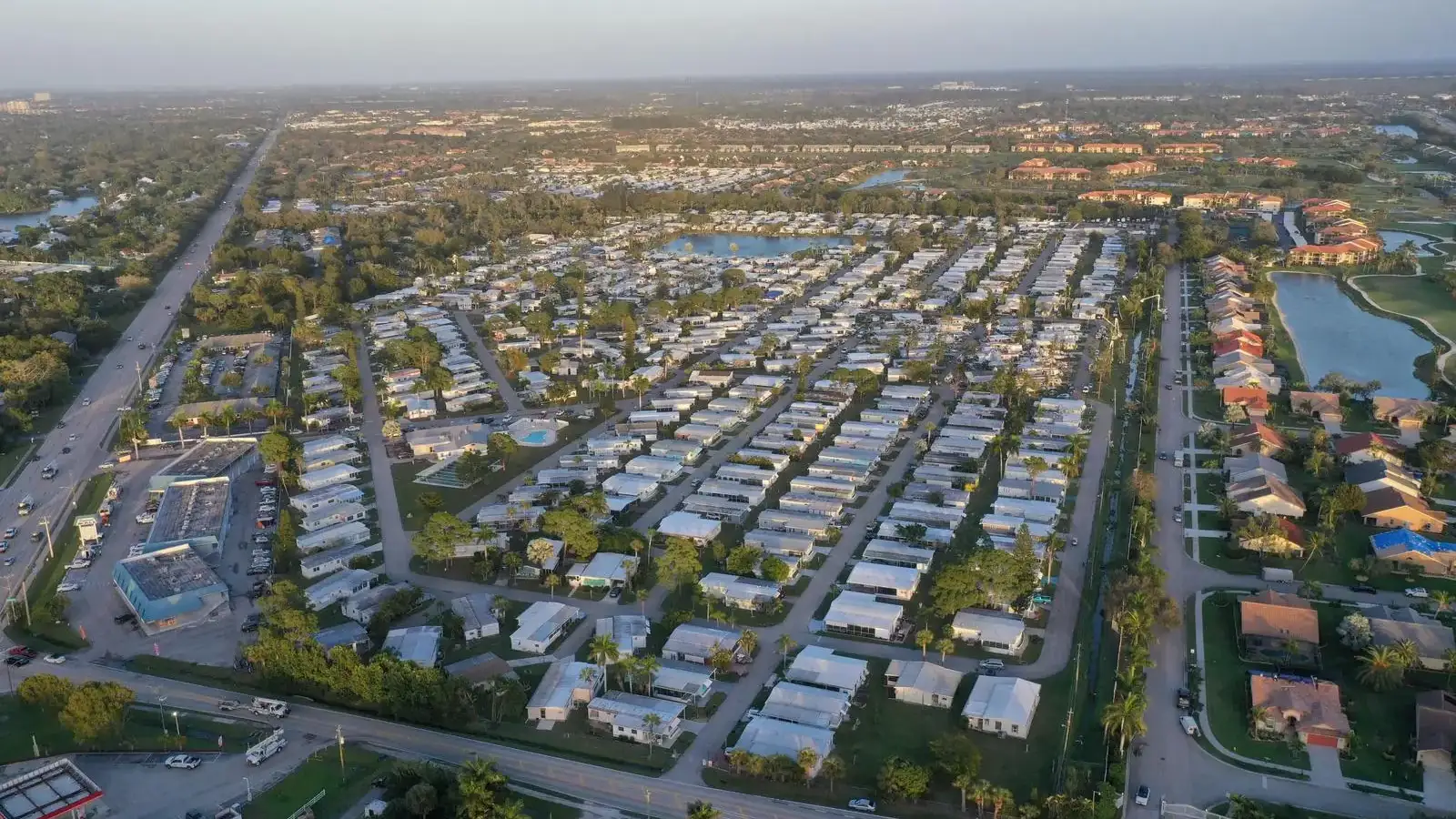 Aerial view of Temple Terrace, FL neighborhoods and tree canopy at sunset